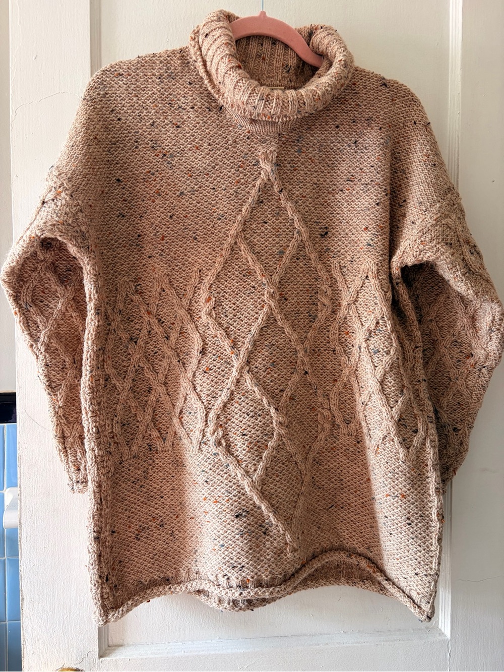Turtleneck Cable Knit Sweater in Speckled Tan